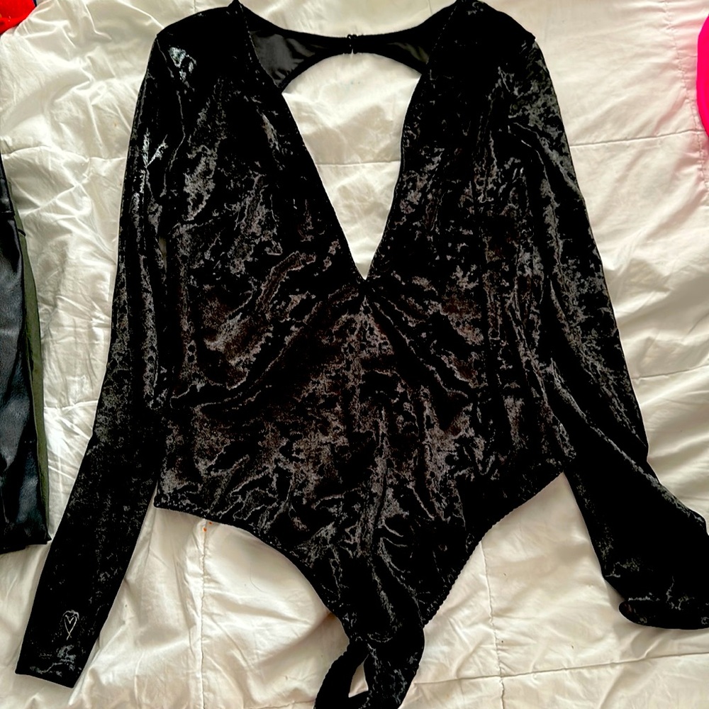 Medium/Large bodysuit never worn